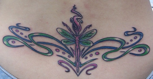 Lower back tattoo, slim girl, dragonfly, ballerina, decorated