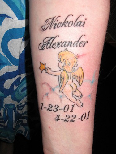 Colourful little angel memorial tattoo