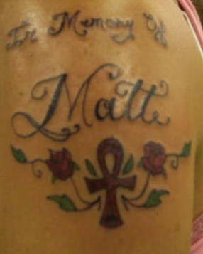 Ankh and roses in memory of Matt tattoo