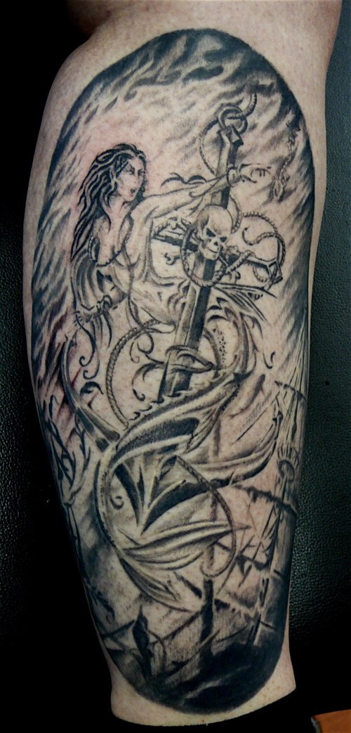 Evil mermaid on anchor with skulls tattoo