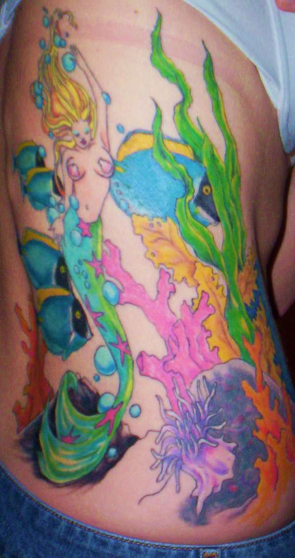 Colourful mermaid in underwater tattoo