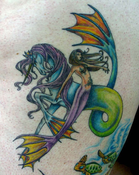 Mermaid with realistic sea horse tattoo