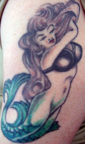 Sexy pin up style mermaid tattoo