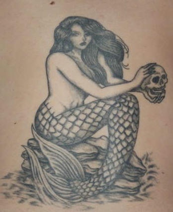 Mermaid with skull black ink tattoo