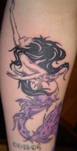 Mermaid with purple tail tattoo