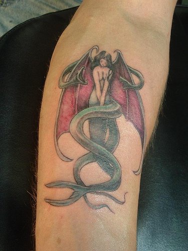 Winged mermaid  with hydra tattoo