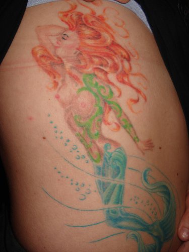 Realistic red haired mermaid tattoo