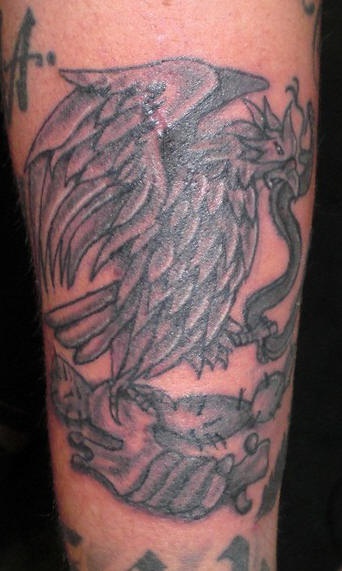Mexican eagle hunting snake on cactus tattoo