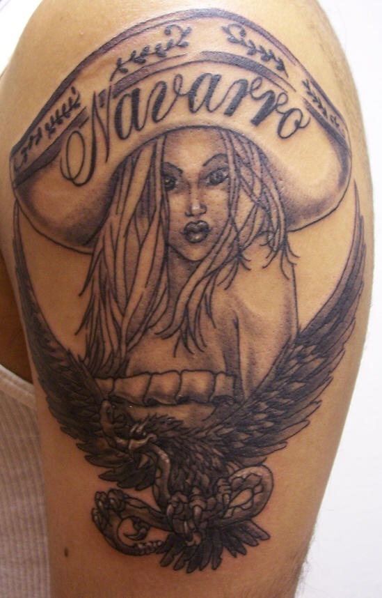 Girl in sombrero with eagle tattoo