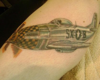 Military fighter airplane tattoo