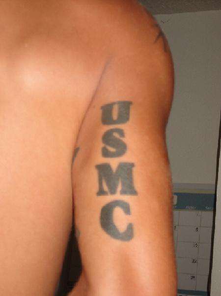 Usmc writing tattoo on arm