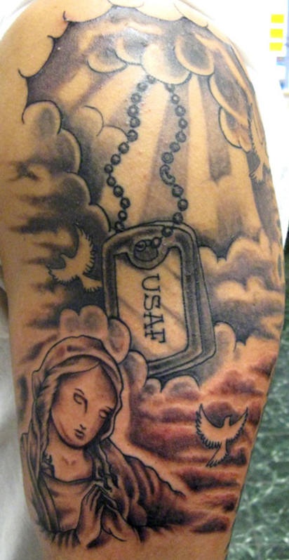 Dog tag in clouds memorial tattoo
