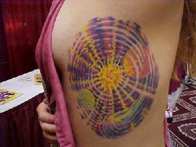 Colourful space tattoo on side