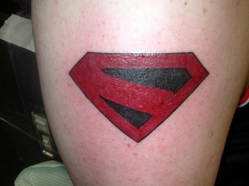 Strange superman logo tattoo