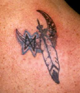 Feather and moon crescent tattoo