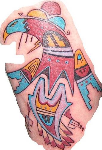 Tribal indian coloured bird tattoo