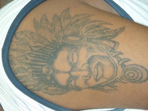 Indian chief in feather crown tattoo