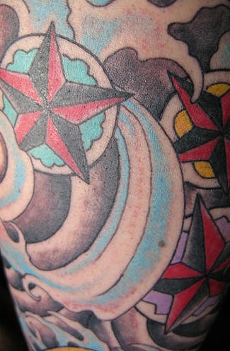 Stelle rosse in bufera tatuaggio