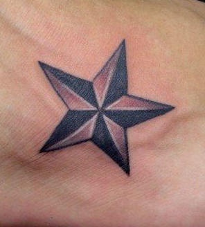 Volumetric star tattoo on foot