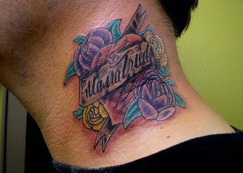 Colourful roses and heart tattoo
