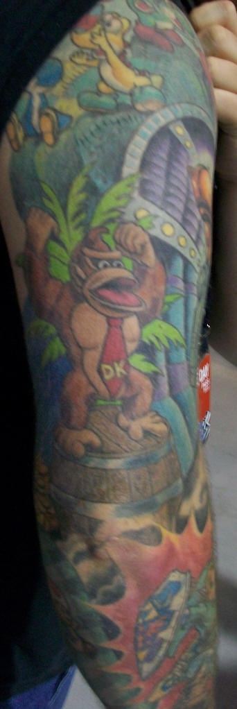 Nintendo theme coloured sleeve tattoo