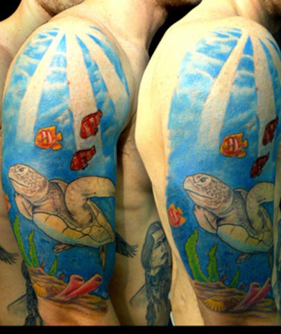 Blue ocean turtle tattoo with fishes