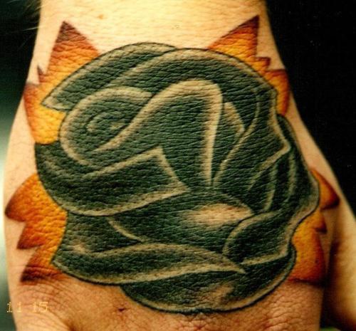 Old school tattoo with black rose