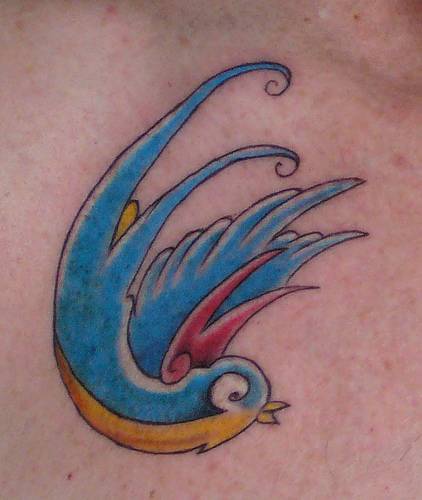 Traditional tattoo with colorful bird