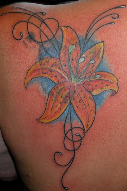 Orange stragezer lily tattoo