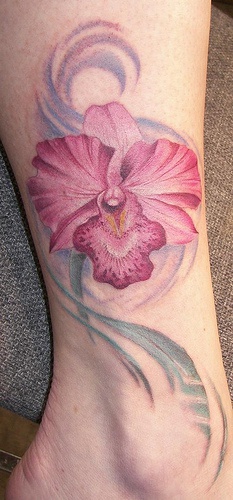 Tender pink orchid flower tattoo