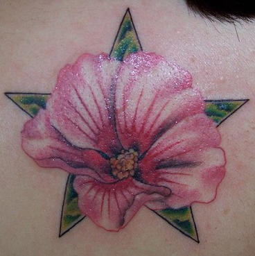 Realistic orchid flower and star tattoo