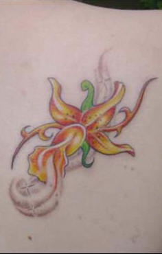 Yellow orchid flower tattoo