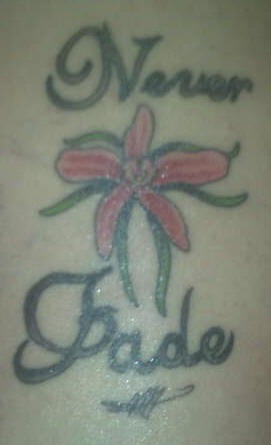 Never fade tatuaggio con orchidea