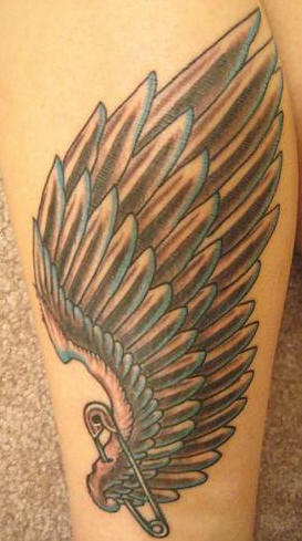 Tattoo with paper clipped wing
