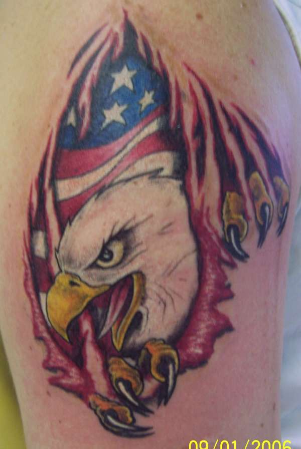 Eagle and usa flag under skin rip tattoo