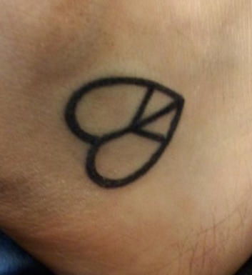 Peace and love symbol tattoo
