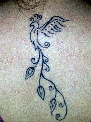 Phoenix black tracery tattoo