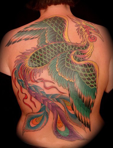 Large colourful magic bird full back tattoo