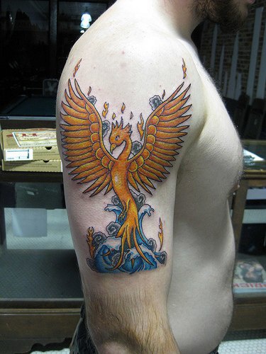 Phoenix resurrects from ashes tattoo