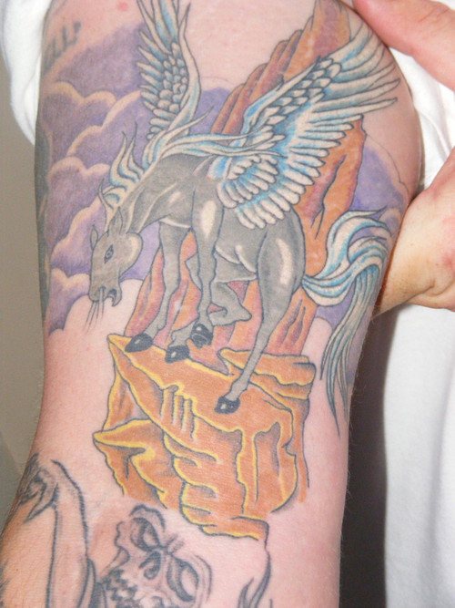 Winged horse on golden throne  tattoo