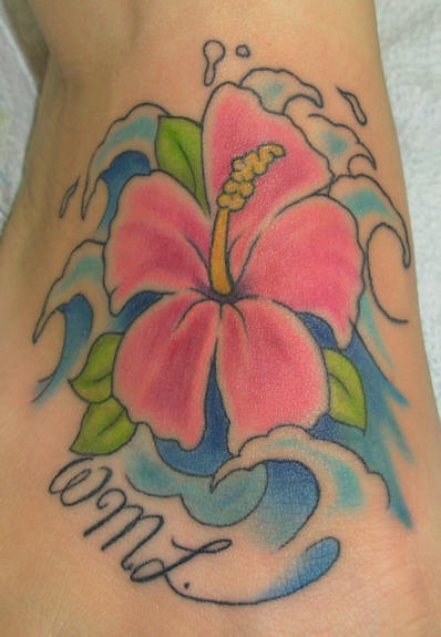 Pink hibiscus flower in sea tattoo