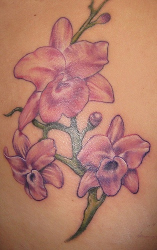Pale pink orchid flower tattoo
