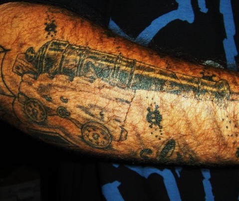 Detailed pirate cannon tattoo