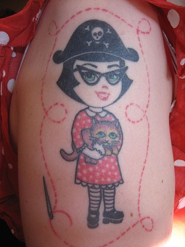 Pirate girl with kitty tattoo