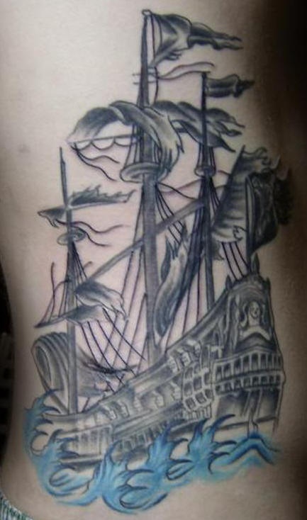 Detailed black pirate ship tattoo