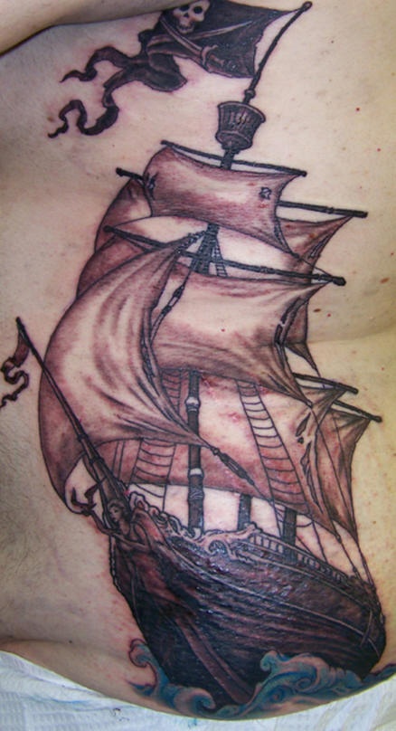 Highly detailed pirate ship tattoo