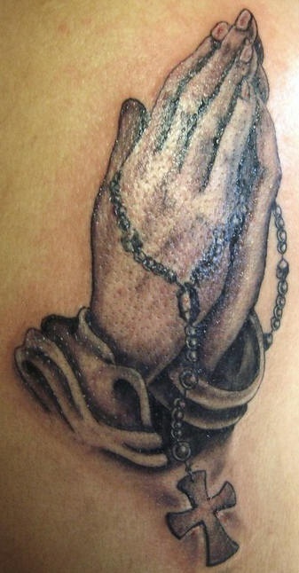 Detailed praying hands with rosary tattoo