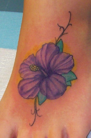 Elegant purple flower tattoo