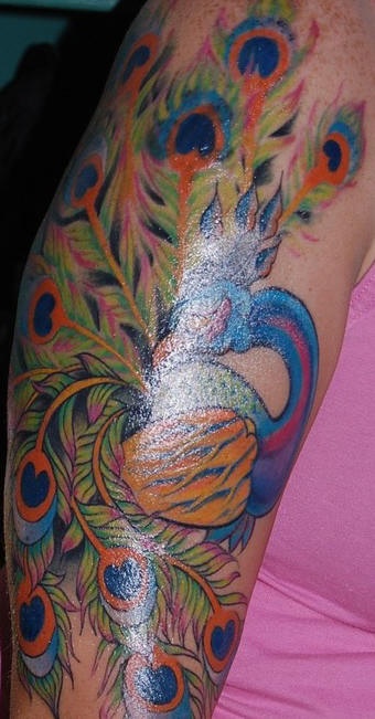 Colourful peacock sleeve tattoo