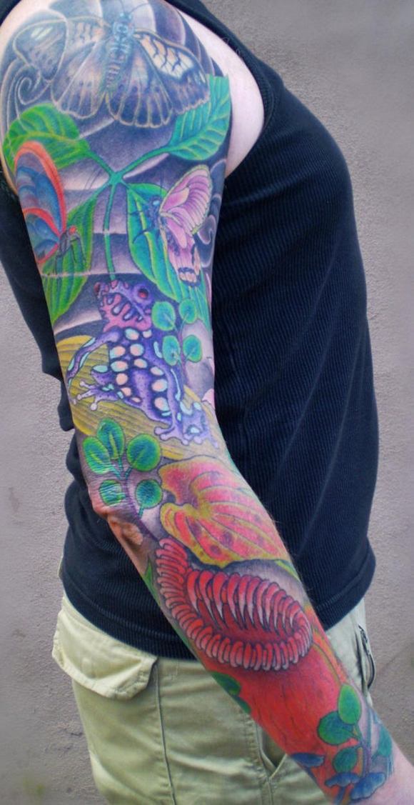 Colourful rainforest sleeve tattoo